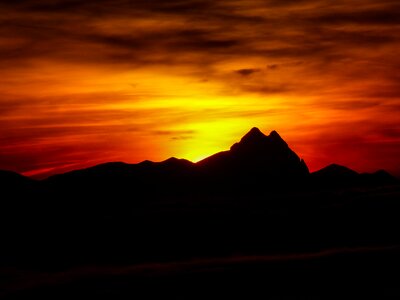 Silhouette romantic mountains photo
