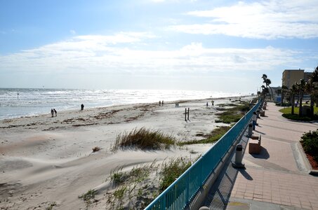 Sand ocean beach front photo