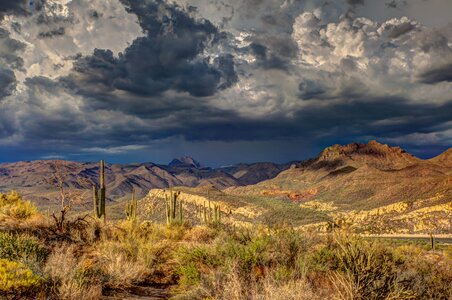 Dark clouds daylight desert photo