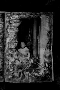 Ruined photos left behind by a Muslim family in Shingal (Sinjar) found in a destroyed home after war with the Islamic State 19