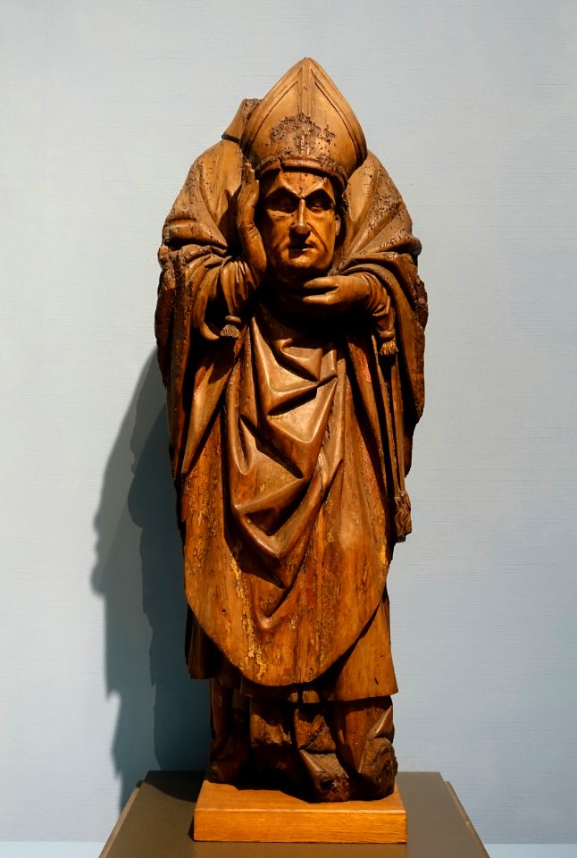 Saint Denis of Paris, probably Brabant, early 16th century, walnut with traces of polychrome, view 1 - Cinquantenaire Museum - Brussels, Belgium - DSC08612