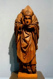 Saint Denis of Paris, probably Brabant, early 16th century, walnut with traces of polychrome, view 1 - Cinquantenaire Museum - Brussels, Belgium - DSC08612