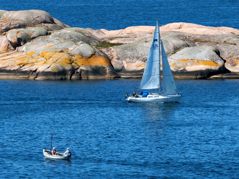 Sailboat and small motorboat in Stångehuvud nature reserve