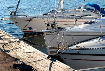 Sailboats at a jetty in Govik 2 photo