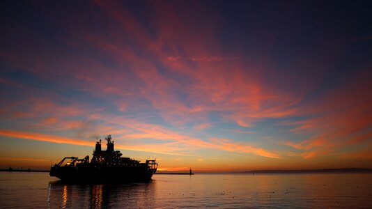 Water sunset seafaring photo