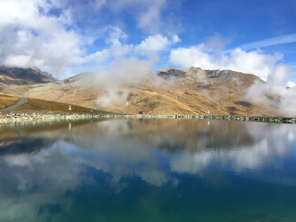 Alpine mirroring clouds