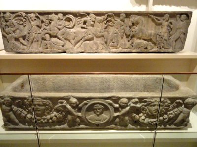 Sarcophagi - (above) Greeks fighting Amazons, c. 150 AD, (below) Putti with Garlands and Medusa masks, c. 225 AD - Royal Ontario Museum - DSC09774