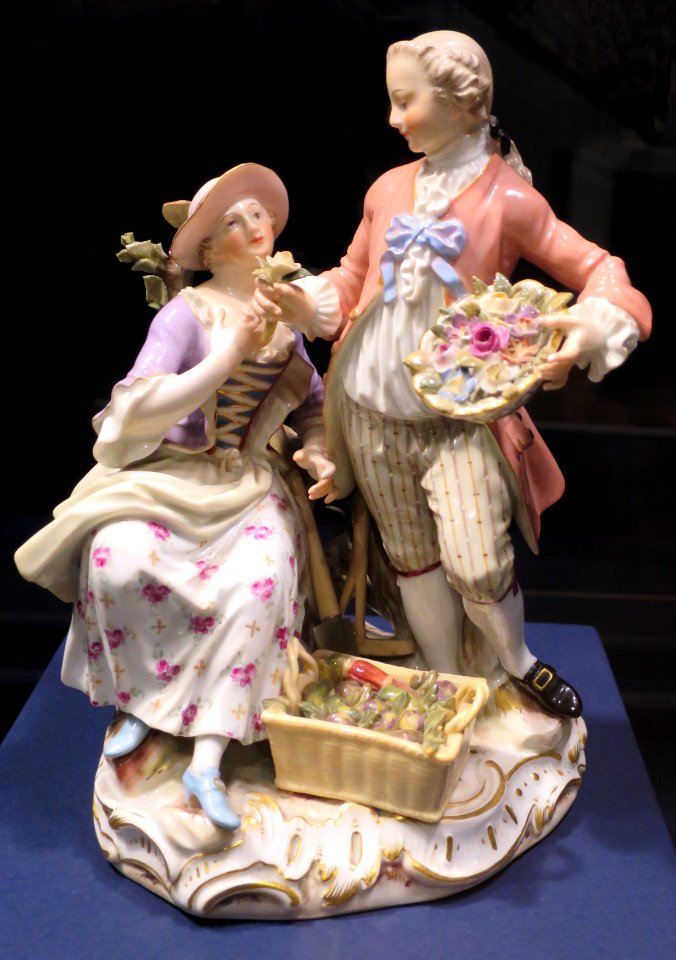 Seated Woman, Basket of Vegetables, and Standing Man with Bowl of Flowers, Meissen figurine