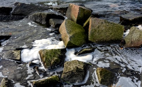 Sea foam among rocks in Loddebo 1 photo