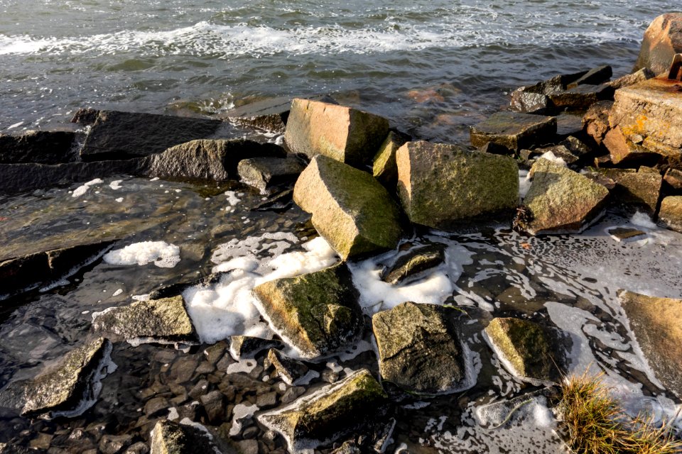 Sea foam among rocks in Loddebo 4