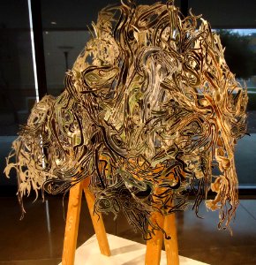 Sculpture by Mark Fox entitled Black Sawhorseman at Cantor Arts Center