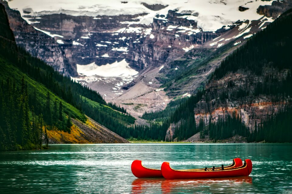 Mountains snow canoes