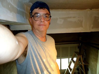 Self-photo of your handyman at work with eyebrows out of control photo
