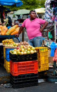 Seller of vegetables and fruits photo