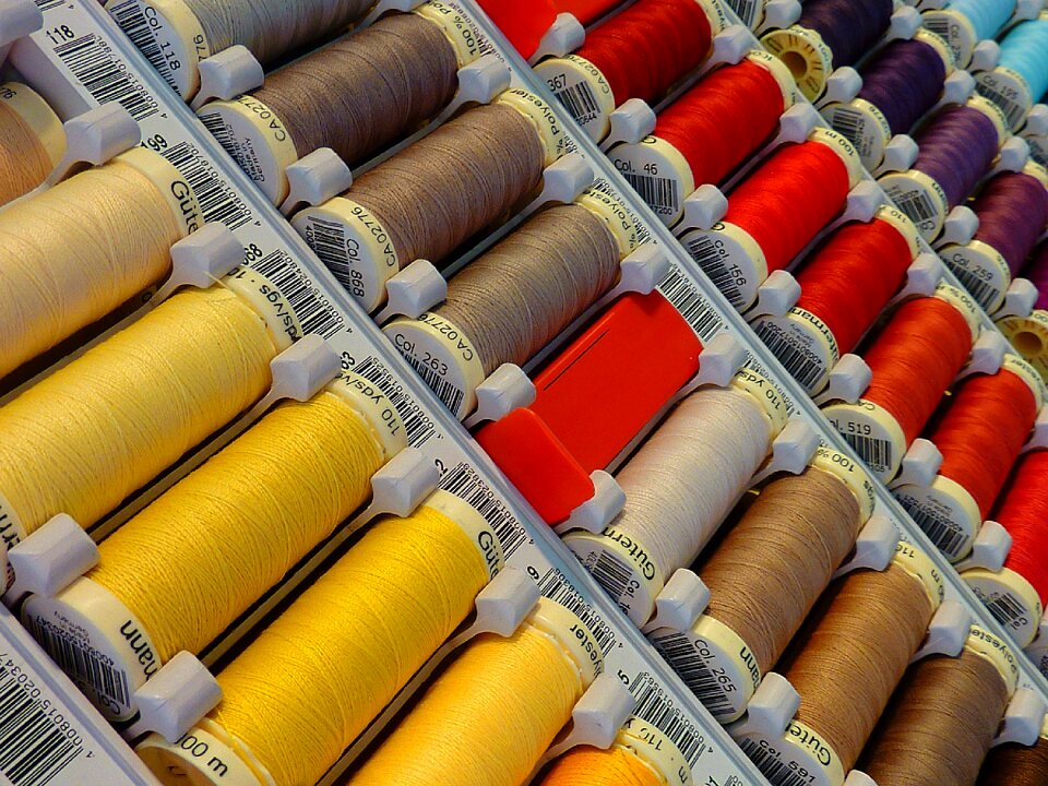 Thread coiled sewing thread