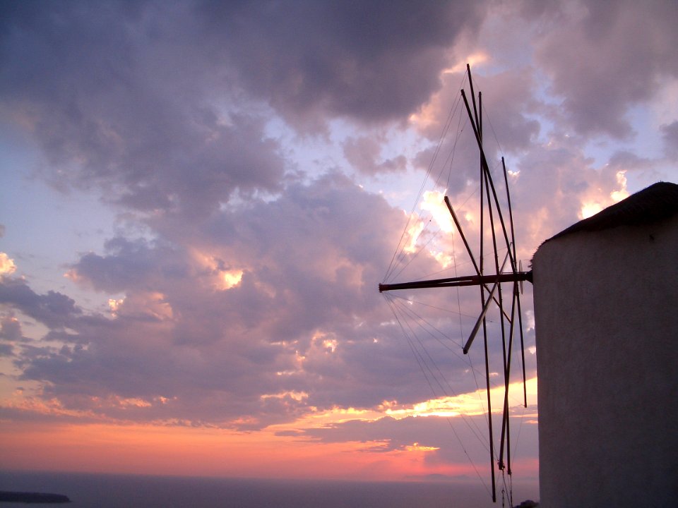 Santorin sunset with windmill