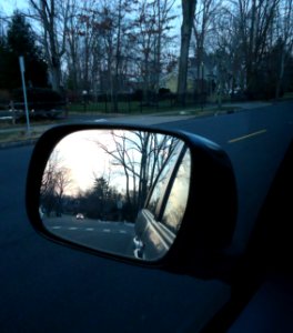 Scene in the rear view mirror of a car