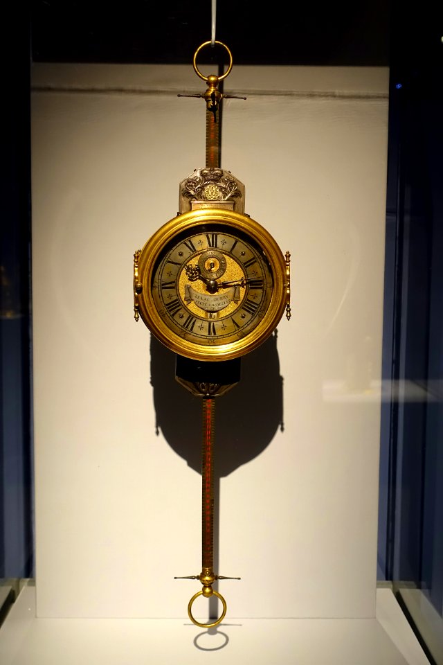 Saw clock by Isaac Ourry, Germany, Kassel, c. 1710, gilt brass, silver, steel, glass - Metropolitan Museum of Art - New York City - DSC07075