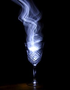 Wine glass light painting black light photo