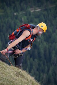 Alpini hiking upstream