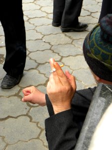 Smoking man Kneeling sitting at Nishapur 2