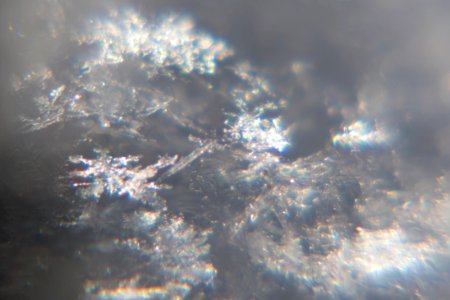 Snow crystals glittering in strong direct sunlight 21 - 22 - 23 - cropped