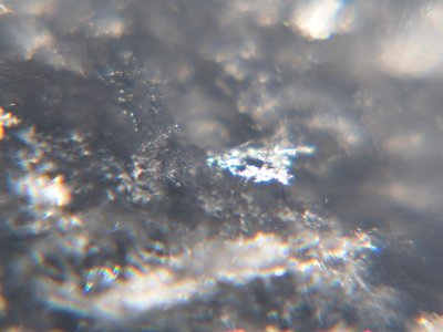 Snow crystals glittering in strong direct sunlight 20