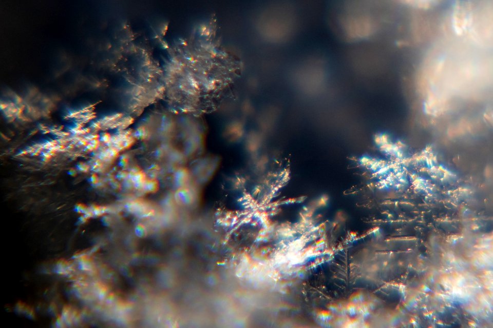 Snow crystals glittering in strong direct sunlight 03 - cropped - high contrast