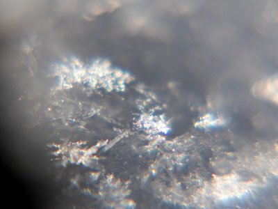 Snow crystals glittering in strong direct sunlight 23 photo