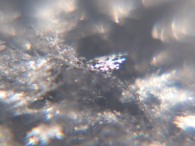 Snow crystals glittering in strong direct sunlight 43 photo