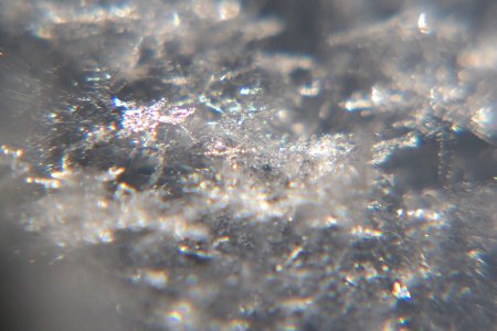Snow crystals glittering in strong direct sunlight 09 - cropped