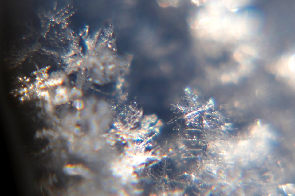 Snow crystals glittering in strong direct sunlight 04 - cropped - high contrast