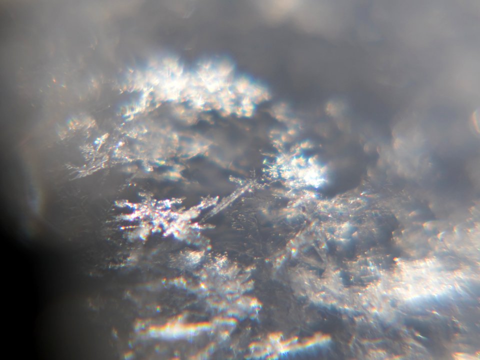 Snow crystals glittering in strong direct sunlight 21