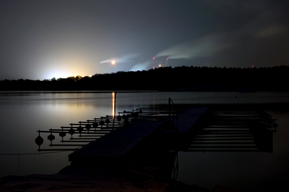 Snowfall at night over Brofjorden and Preemraff oil refinery 1