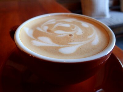 Latte art cup of coffee latte