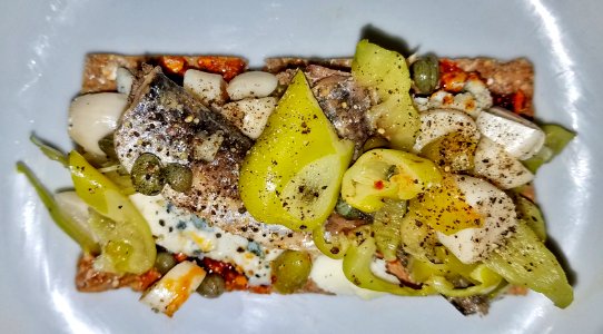 Smørrebrød homage 02 - anchovies, blue cheese, pickled garlic, peperoncini, capers, pepper, S&B umami paste on Wasa rye crisp - Massachusetts