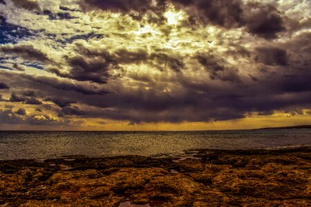 Clouds stormy sea photo