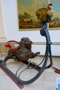 Sled with lion pursuing a rooster, 18th century, wood, metal, leather, view 1 - Cinquantenaire Museum - Brussels, Belgium - DSC08880