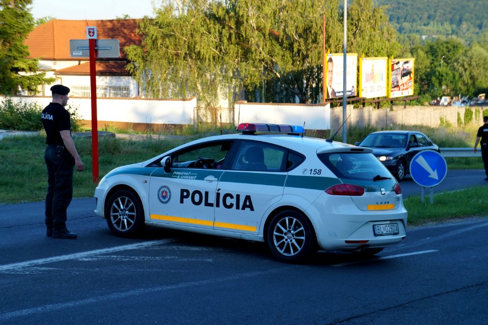 Slovak police car and police officer on duty