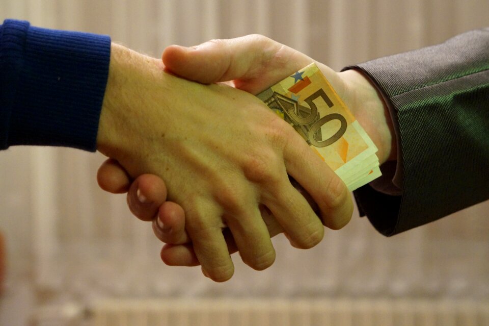 Transaction people shaking hands