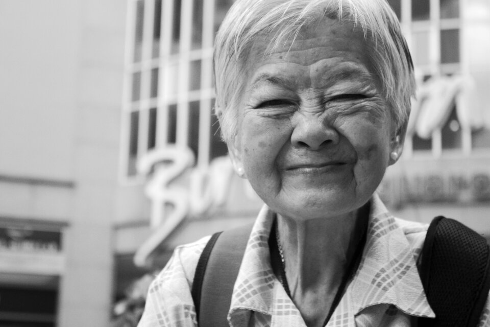 Old woman asian gray smile