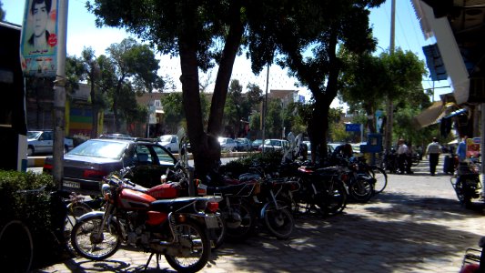 South Firdawsi st 20 - near east portal of Grand Mosque - motorcycles parked in sidewalk - Nishapur 2