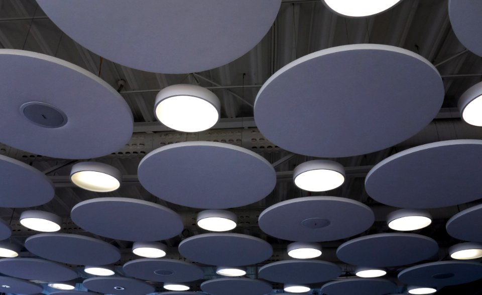 Sound absorbers and lamps in the ceiling of Max restaurant in Torp
