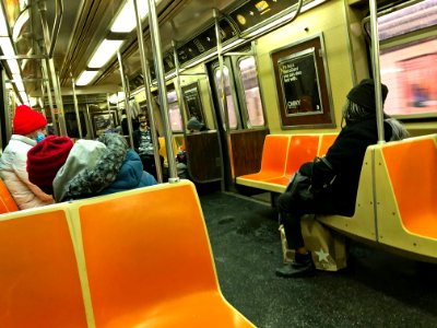 Social Distancing on Q train in Brooklyn during 2020 COVID pandemic photo