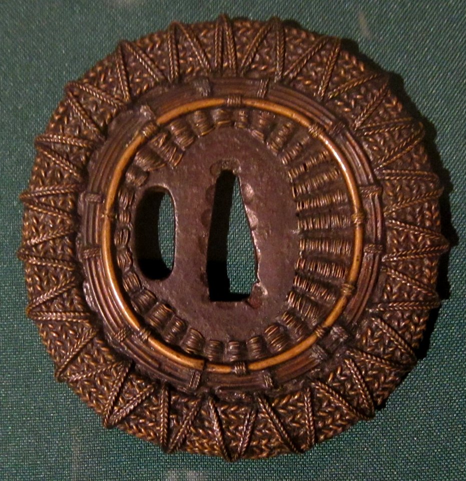 Shingen type sword guard (tsuba), 17th century Japan, brass and copper