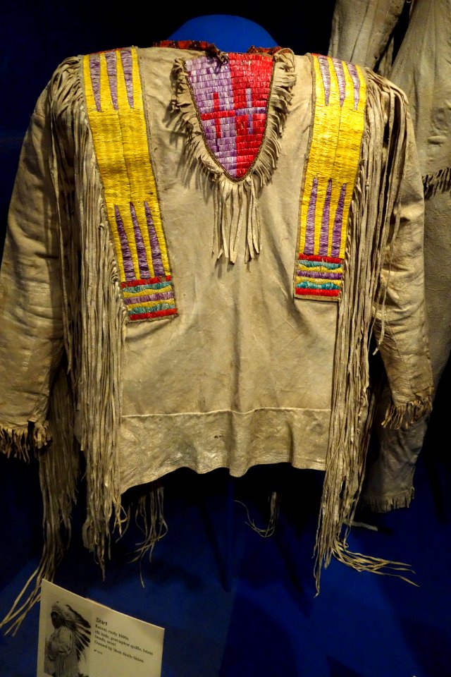 Shirt owned by Shot-Both-Sides, Kainai, early 1900s, elk hide, porcupine quills, brass beads, wool - Glenbow Museum - DSC01028