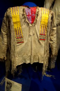 Shirt owned by Shot-Both-Sides, Kainai, early 1900s, elk hide, porcupine quills, brass beads, wool - Glenbow Museum - DSC01028