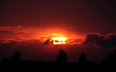 Setting sun afterglow clouds photo