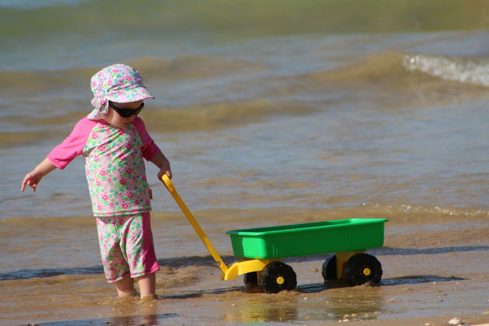 Playing in the sand kid joy of child