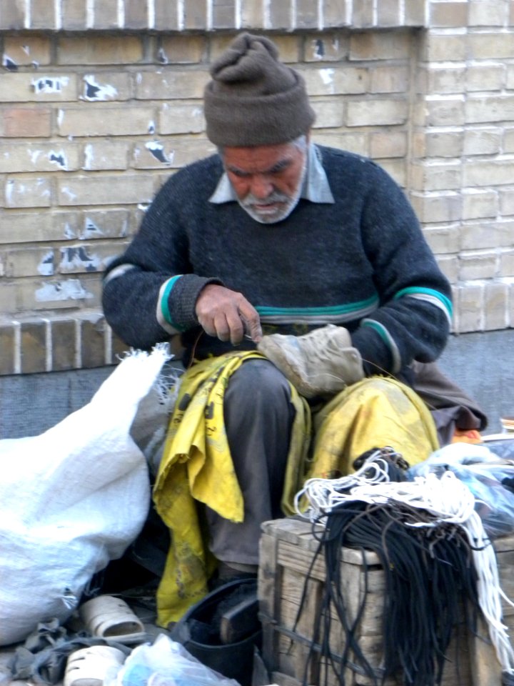 Shoemaker working at Street 3